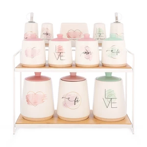 طقم توابل، 12 قطعه مع حامل، بورسلين عالى الجوده بقاعده معدنيه - الوان متعدده 